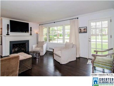 Gas logs make this family room a warm spot to gath