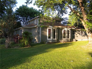 This view of the side and back of the home shows m