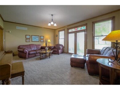 Family Room with Lots of Large Windows and Access 