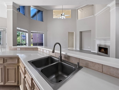 Double sink and eat-up bar- open to main living.