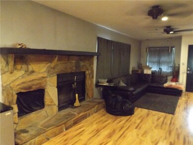 Large comfortable living room dining room with woo
