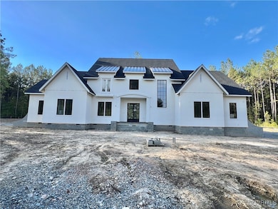 Front of the Home Feat Stucco, Metal Roof Detailin