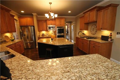 WHAT A NICE KITCHEN !! GRANITE , STAINLESS , HUGE ISLAND