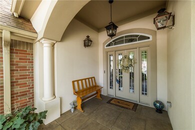 Front entry detail (2 gas lamps on either side of