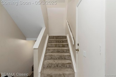 Stairs lead to the living area.
