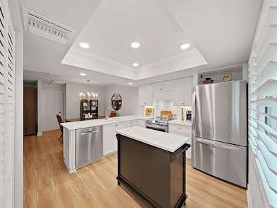 The Kitchen overlooks the adjacent Dining Room.