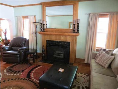 Beautiful Decorative Fireplace anchors North Wall