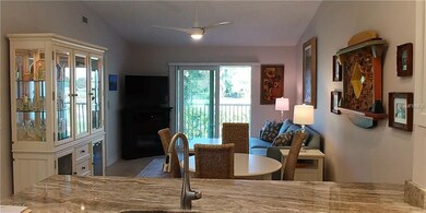 View from the kitchen of the dining area, living r