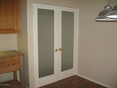 Pantry w/ double glass doors