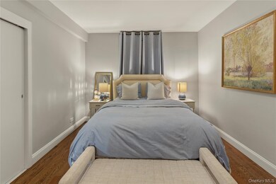 Bedroom featuring wood finished floors