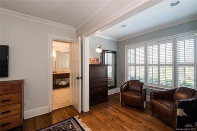 Master bedroom sitting room and bathroom.