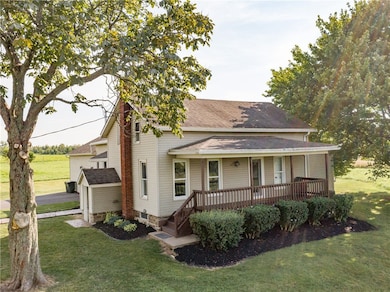 Charming porch with picturesque view of the lake.