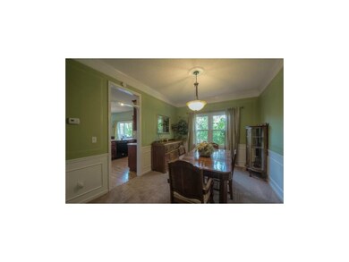 CHARMING FORMAL DINING ROOM.