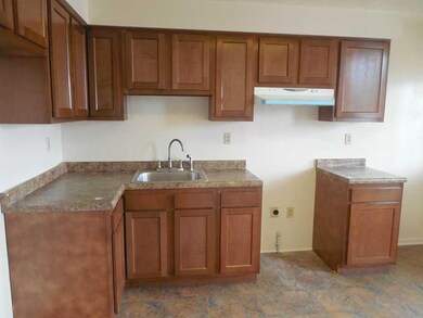 Kitchen. Both apartments contained within have bee