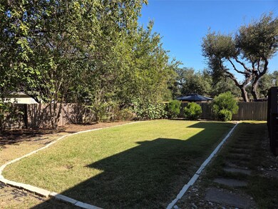 View of fenced backyard