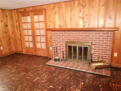 BRICK FACED FIREPLACE AND TILE HEARTH! THE CLASSIC