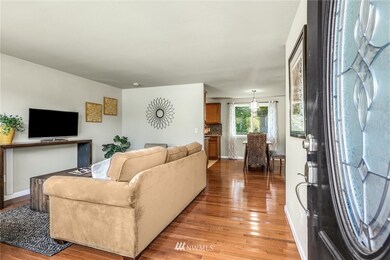 Beautiful real hardwood floors flow through the LR/DR/hallway.