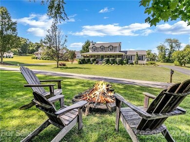 Sit by the fire pit and enjoy the sound of the cre