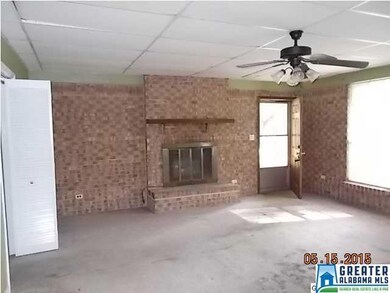 den with gas log fireplace