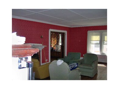 Living Room. view from stairs - dining room at bac