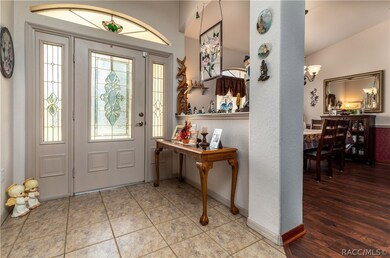 Foyer with dining area to left and office to the r