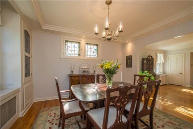 The formal dining room also has hardwood floor, an