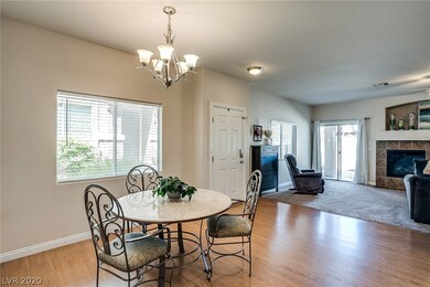 Wood Laminate flooring in Kitchen and Dining Room.