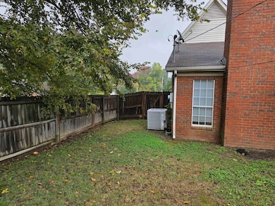 View of fenced backyard