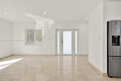 Main house view to the front door & living area