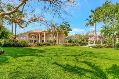 Gorgeous builders acre lot w/ lush tropical landscape