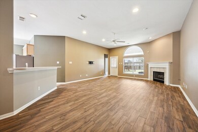 Alternate view from the front hallway. Wood burnin