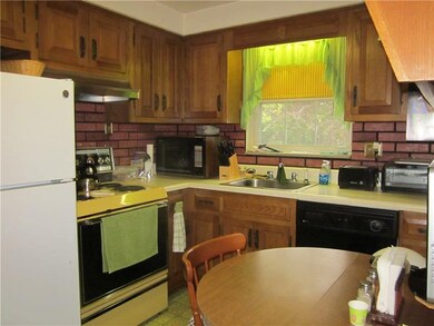 kitchen large enough for a table for breakfast mor