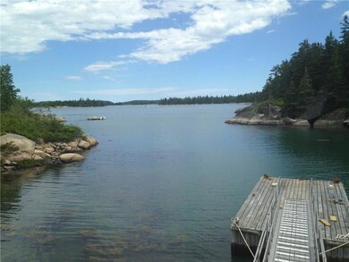 Dock, in coming tide, with view...