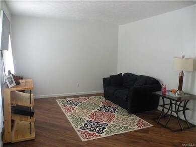 Living room with laminate wood flooring