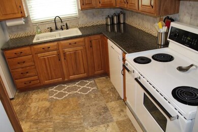 Lovely cabinets with granite counter tops & black 