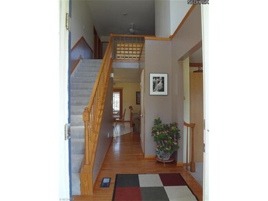 Hardwood 2-story foyer invites you in!