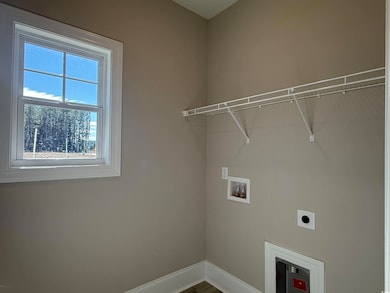 Laundry area with washer hookup, laundry area, ele