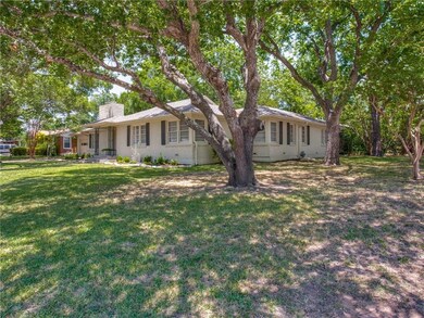 Corner lot provides mature trees and landscaping i