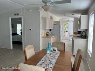 dining area into kitchen
