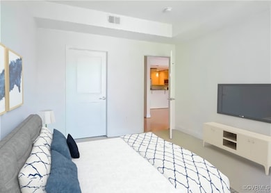 Bedroom featuring visible vents