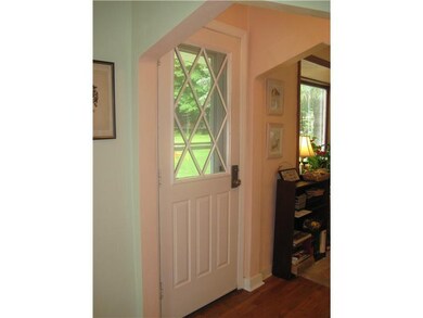 Entry/Foyer. Pretty hardwood floors and sunny entr