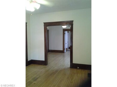 1804 W58 downstairs living to dining rooms