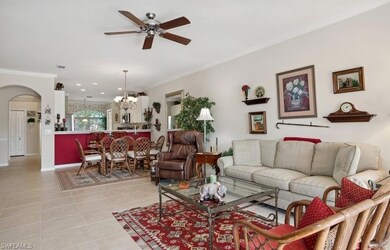 Living room featuring light tile patterned floorin