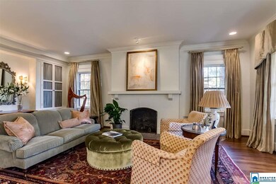 Tall ceilings, deep crown molding, 1 of 2 fireplac