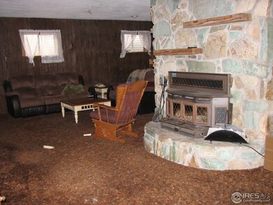 Fireplace Separates Living & Family Room