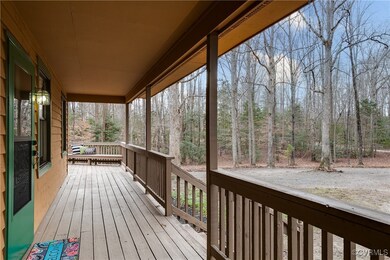 Covered porch spans
entire width of home.