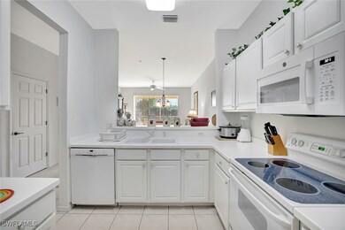 3972 Bishopwood Ct E unit 2-203, Naples, FL 34114 - photo 6