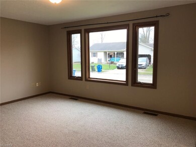 Large living room windows bring tons of light into