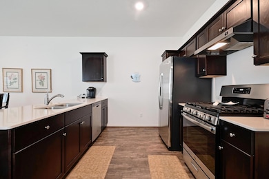 Kitchen featuring a sink, appliances with stainle