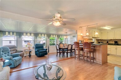 view from living room towards kitchen, dining room